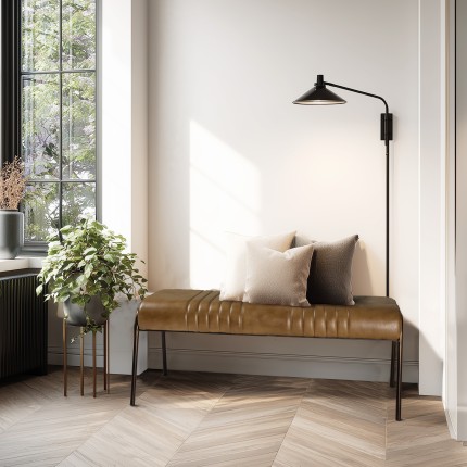 Banc matelassé en cuir marron et pieds acier