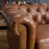 Fauteuil marron capitonné vintage OCTAVE